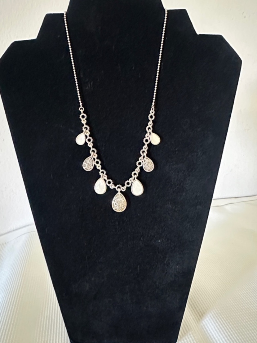 Silver Teardrop Charm Necklace with Mother-of-Pearl Accents